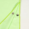 Close-up of StayDry absorbent green hooded towel fabric with durable snap button closure, designed for quick-drying after swimming, beach or shower use.