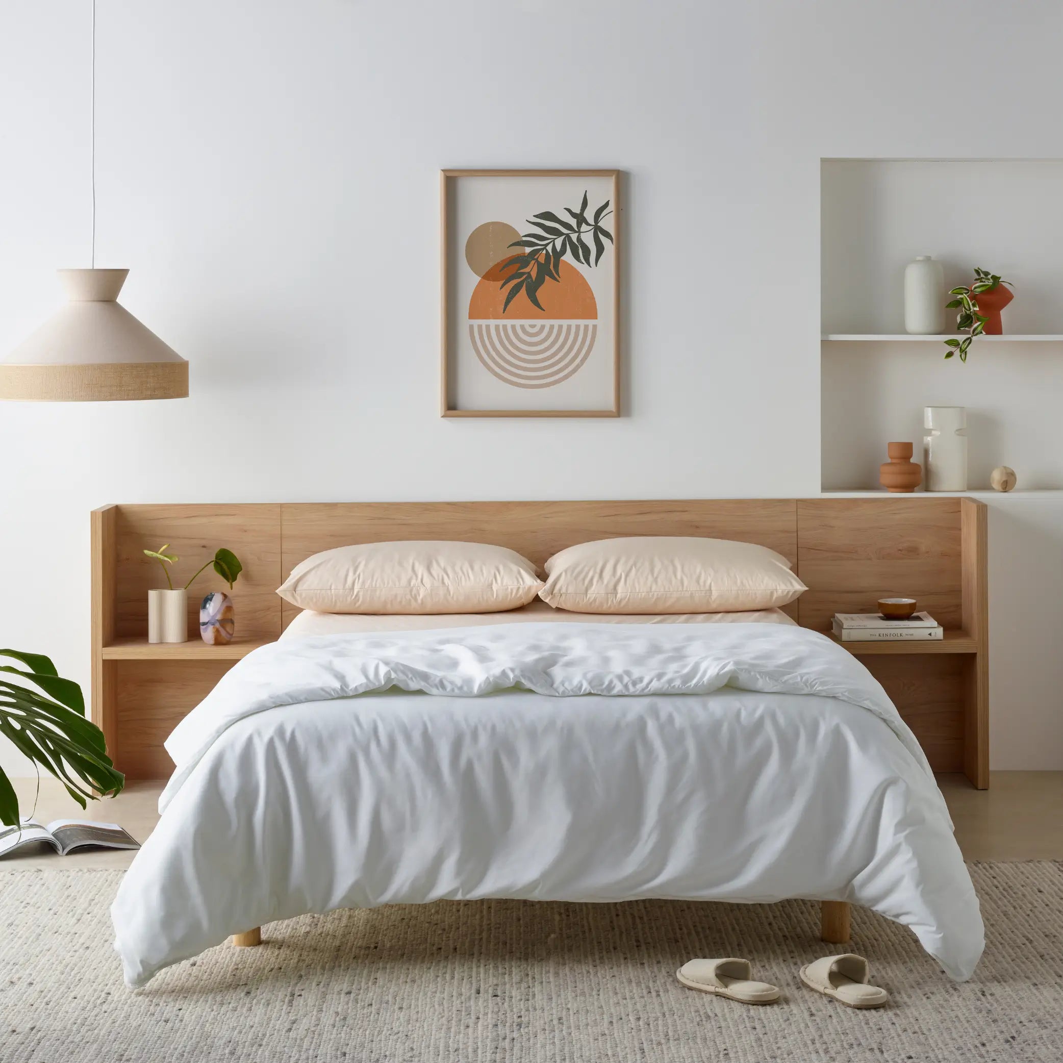 Luxurious water-resistant wool quilt on a modern minimalist bed, featuring breathable and temperature-regulating wool filling for year-round comfort. This hypoallergenic quilt provides warmth without overheating, making it the perfect lightweight bedding essential for a cosy and restful sleep.