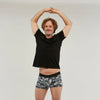 StayDry men's waterproof incontinence trunks in a black and white tropical print. Designed for comfort and confidence, these absorbent boxer briefs offer discreet leak protection with a stylish, breathable fit.