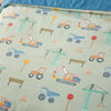 Close-up of a kids' waterproof quilt cover featuring a fun construction-themed pattern with excavators, dump trucks, cranes, stop signs, and traffic cones on a soft sage green background. Made from moisture-resistant, breathable fabric, this durable and machine-washable bedding provides incontinence protection.