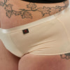 Close-up of StayDry full brief underwear in skin tone, showcasing the breathable, waterproof, and absorbent fabric designed for incontinence protection and everyday comfort.